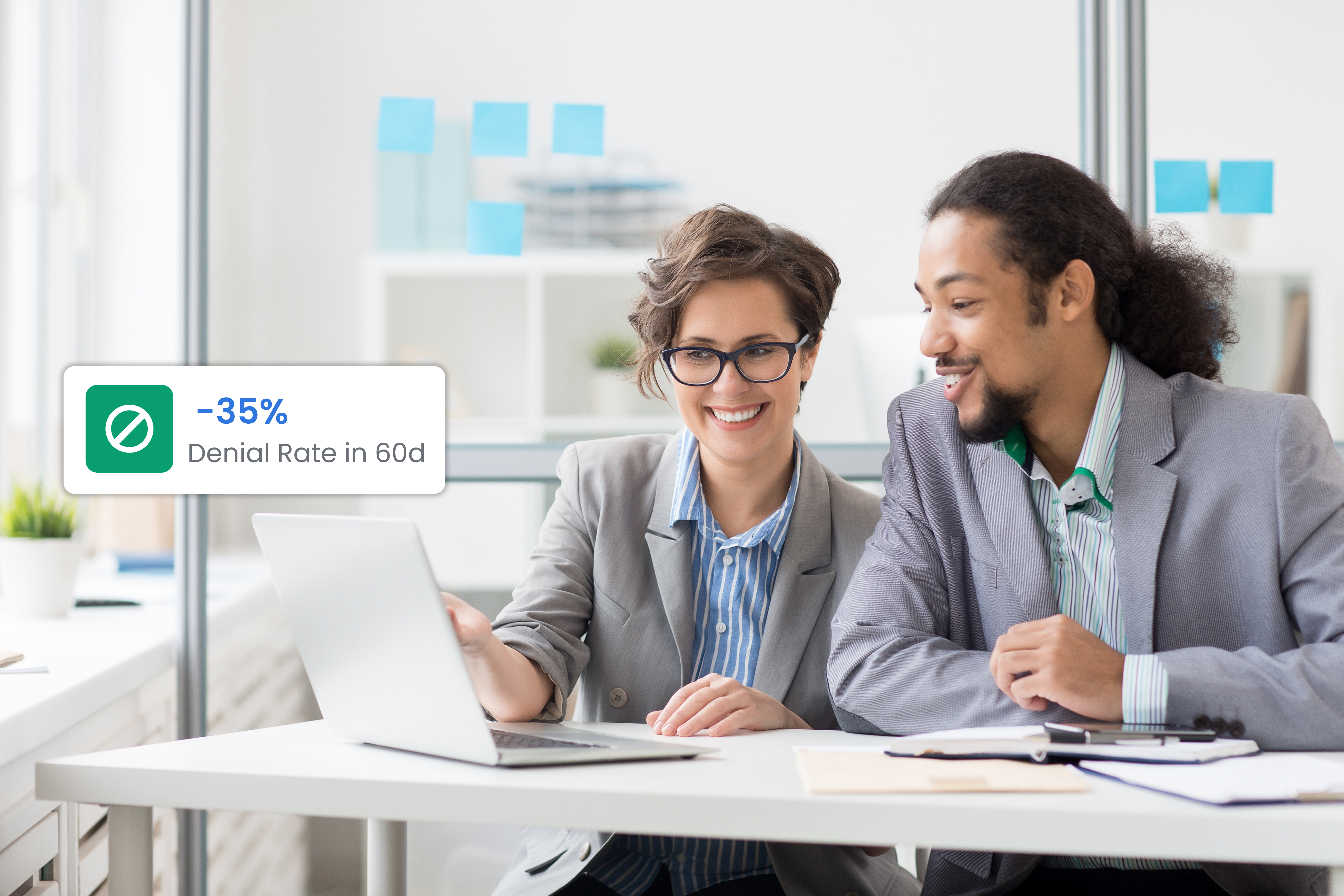 Healthcare practice team reviewing denial reduction analytics on ZeroDenial dashboard